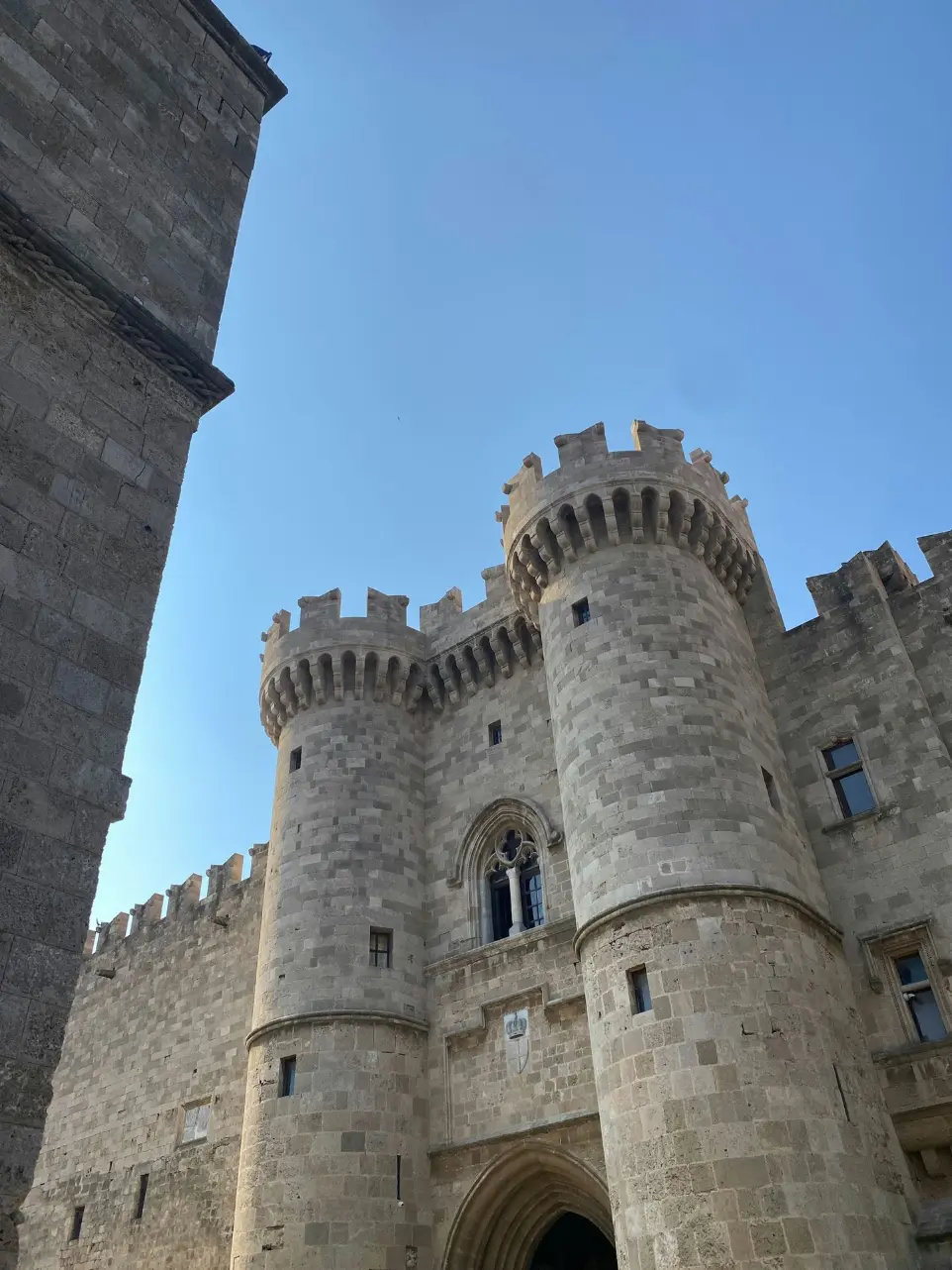 a castle with a clock on the front of it
